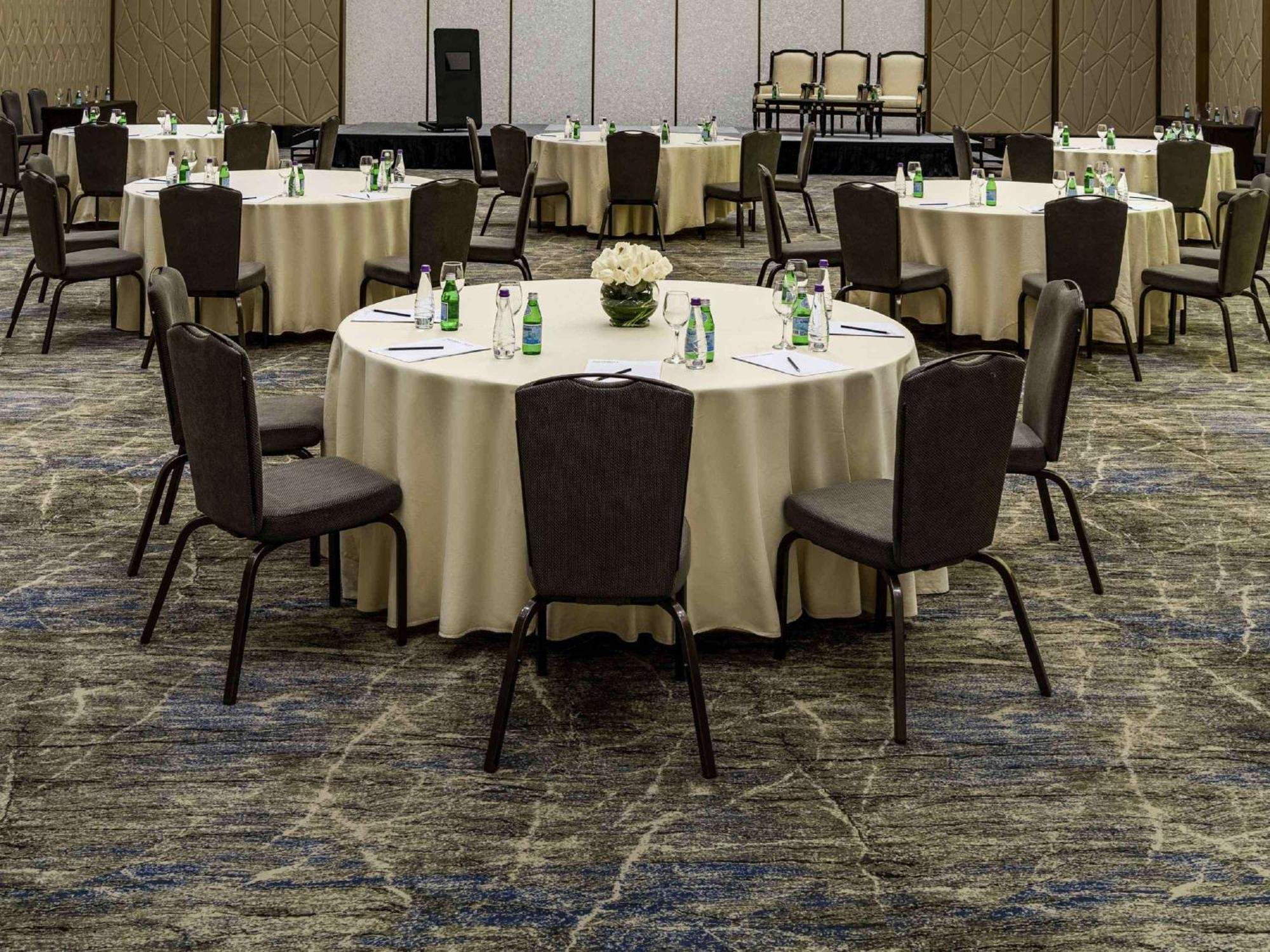 Movenpick Hotel And Residences Riyadh Exterior photo A round table set for a meeting